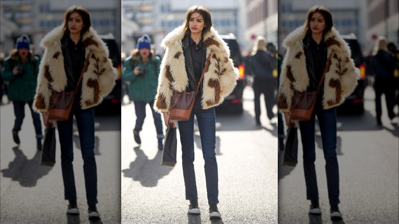 Woman wearing furry winter coat