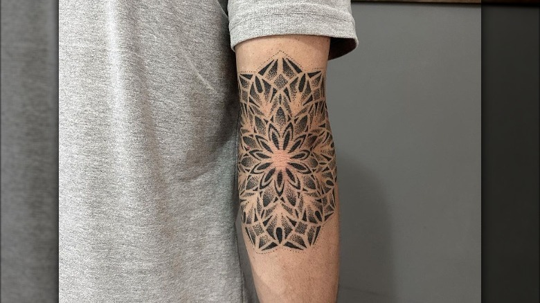 black ink mandala tattoo