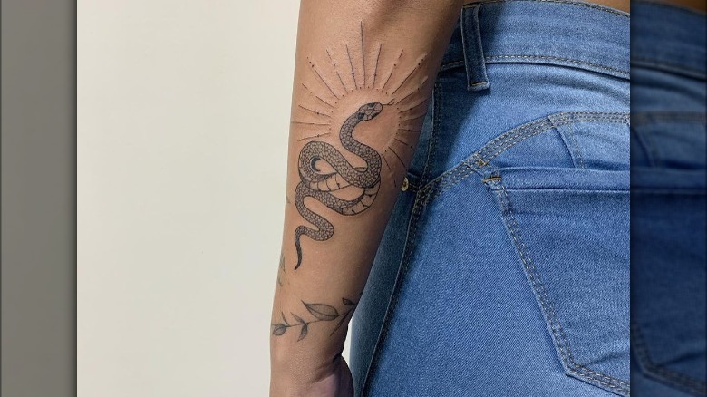 snake black ink tattoo
