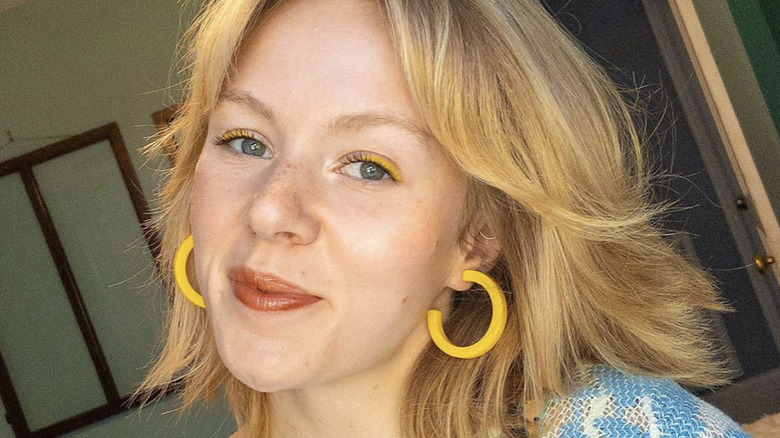 woman with yellow eyeliner