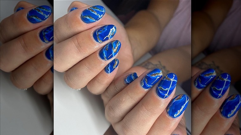 agate nails in vibrant blue