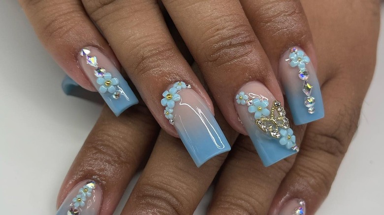 blue and gold flower decal manicure