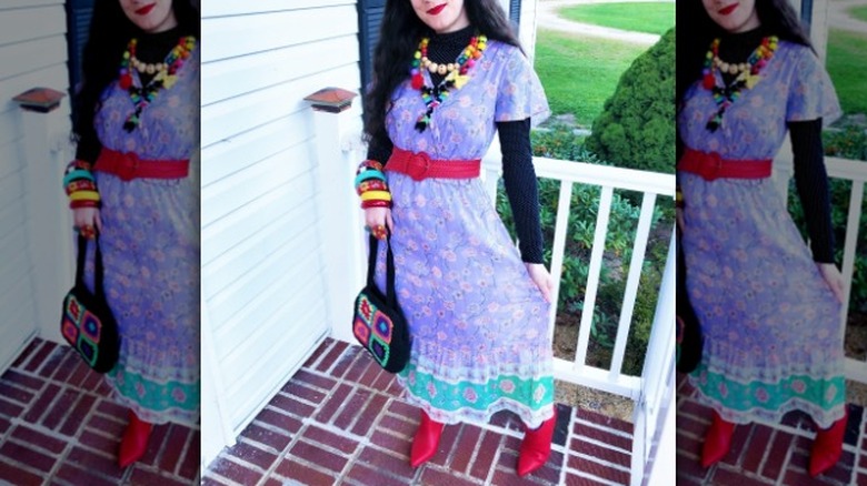 Purple dress and a red belt