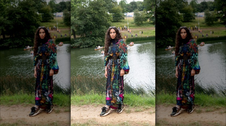 Woman wearing kaftan in park