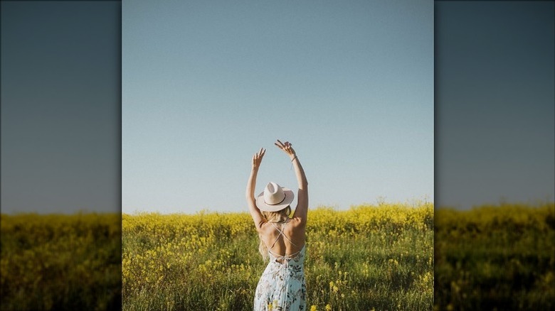 Woman posing in the field