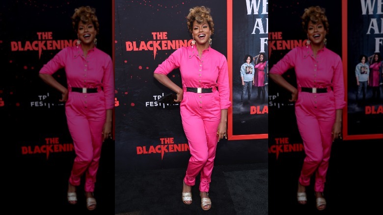 Cassandra Freeman wearing magenta boiler suit jumpsuit