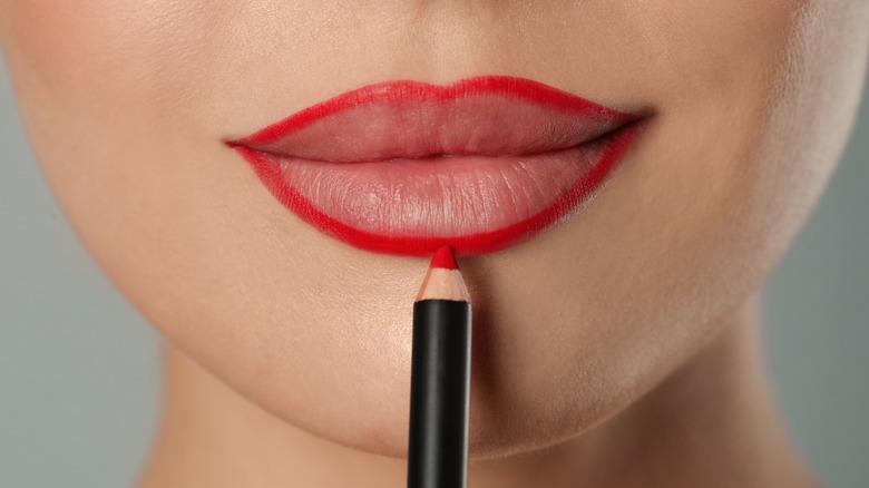 lips with bold red liner