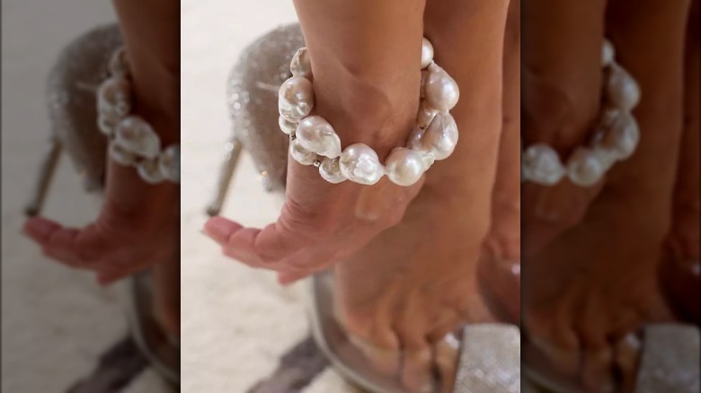 Bold pearl bracelet on wrist