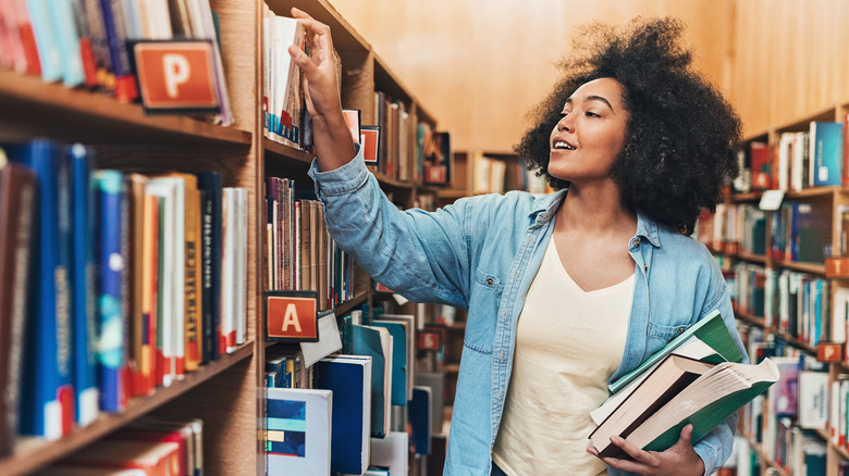 Woman browsing in library