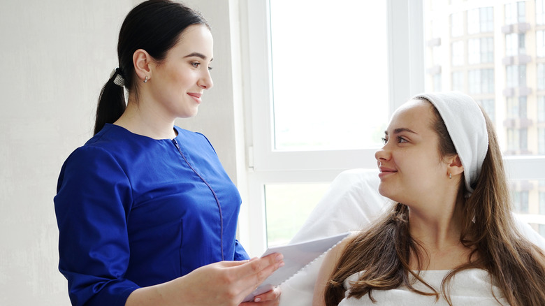 Botox provider and patient smiling