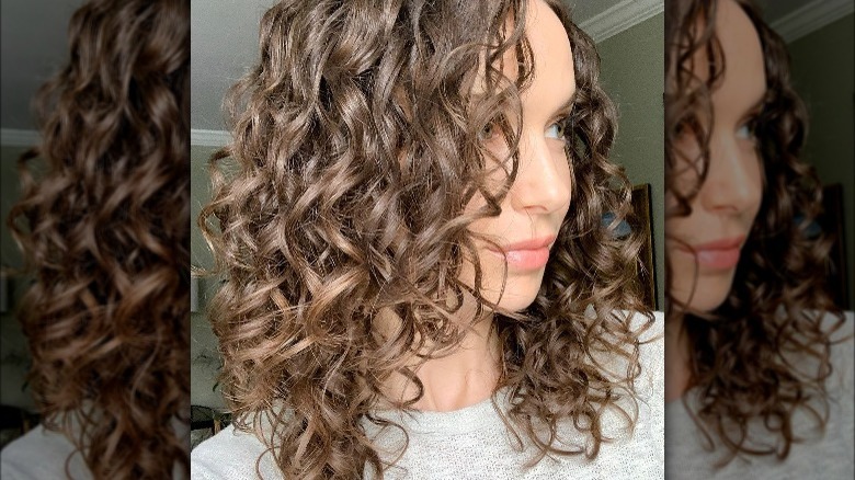 Woman with short curly hair