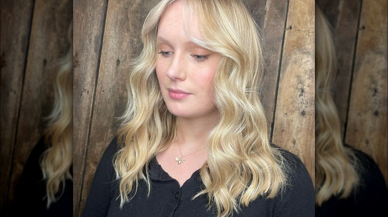 Woman with blond wavy hair