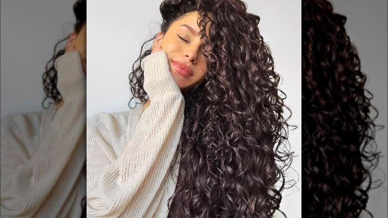 Woman with long, voluminous curls