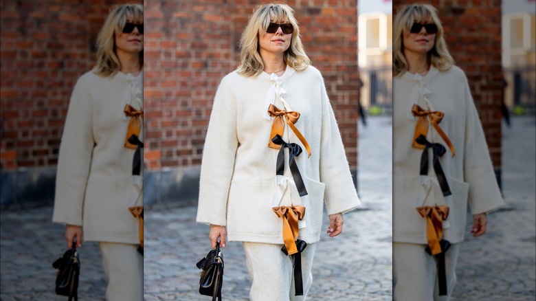 White cardigan with bows