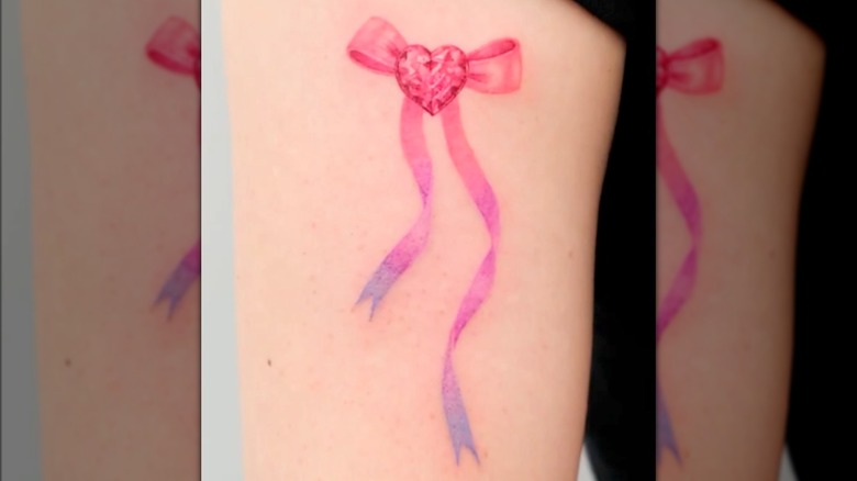 Watercolor bow tattoo