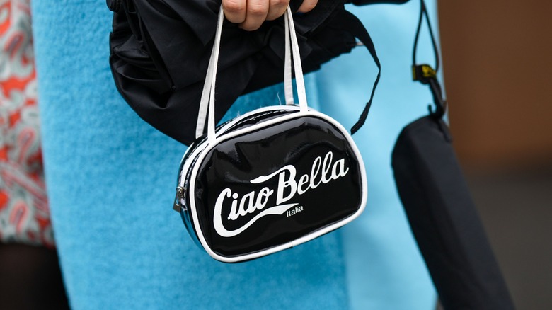 Small black bag that says "Ciao Bella"