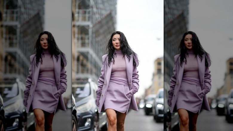 Woman in a lavender outfit