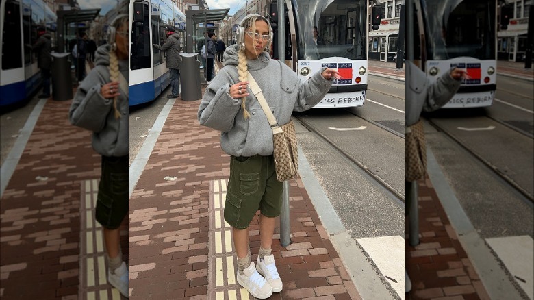 Masculine outfit with braided ponytail