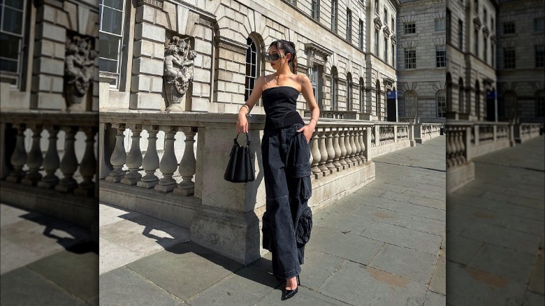 All black outfit and braided ponytail