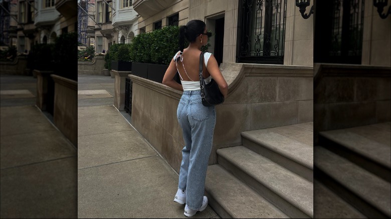 Blue jeans, shirt, and ponytail braid