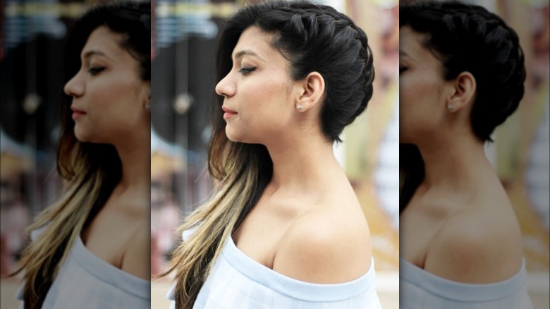 A woman with a faux undercut braid