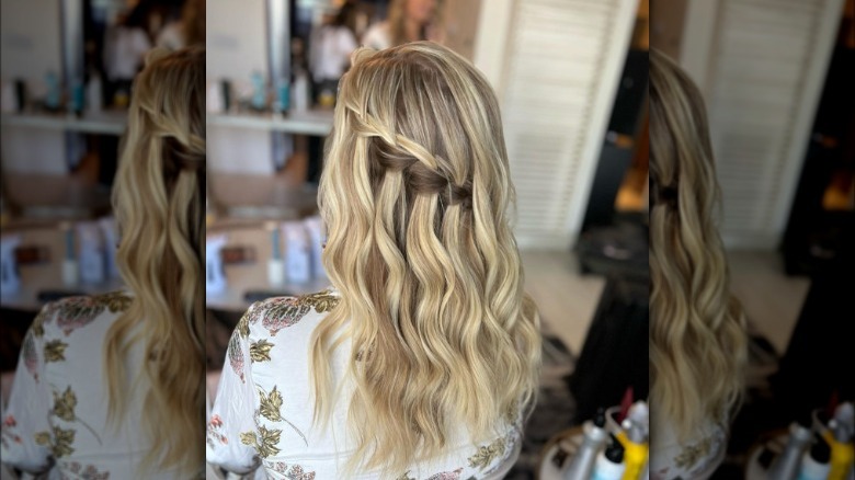 A woman with a waterfall braid