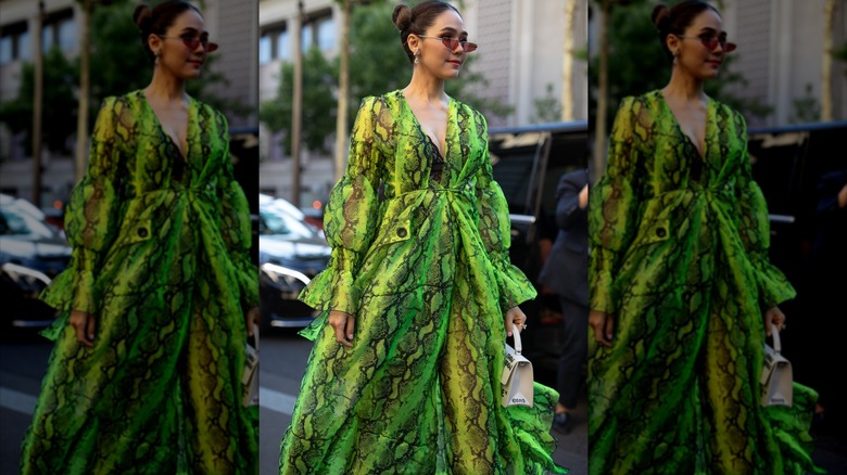 Woman wearing bright-green snake-skin dress 