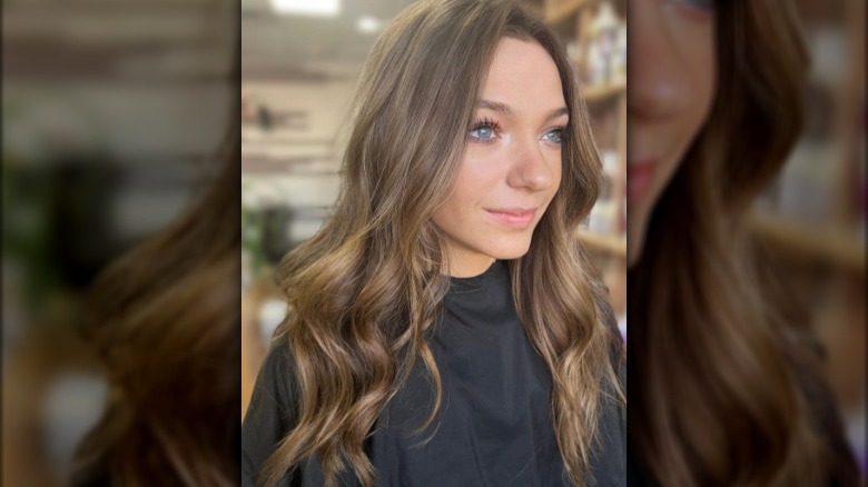 A woman with winter gold brown hair