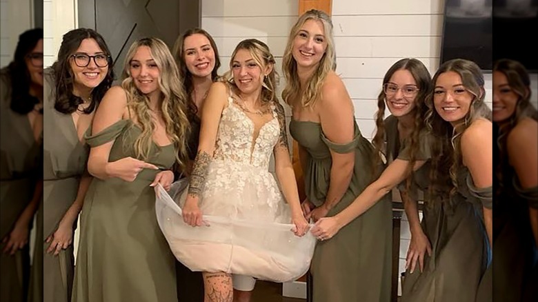 Bride with bridesmaids in green dresses