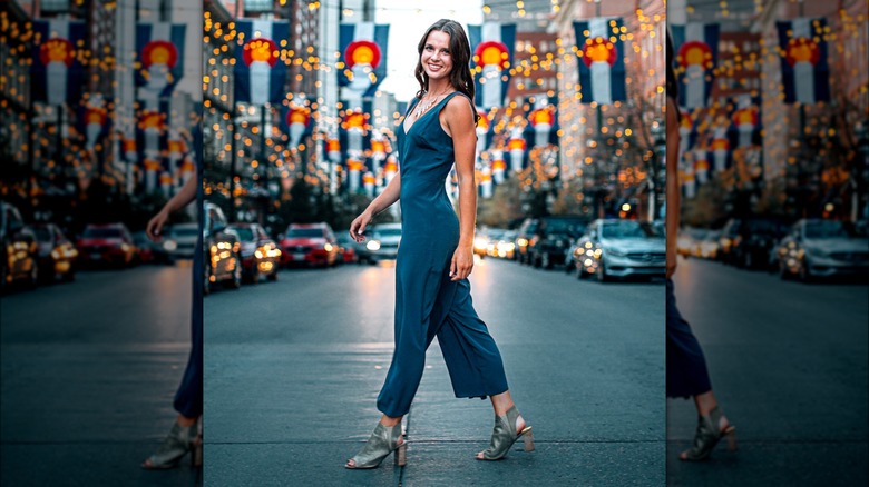 Woman wearing stylish blue jumpsuit