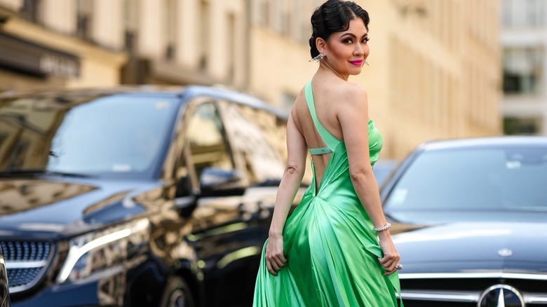 Woman wearing silky green dress