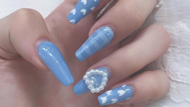 Blue coquette manicure 