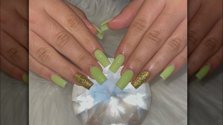 Chartreuse manicure with gold accents
