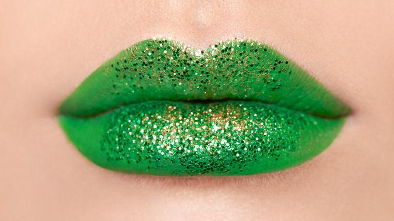 Girl wearing green lipstick