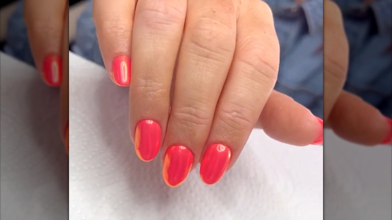 Coral chrome nails manicure