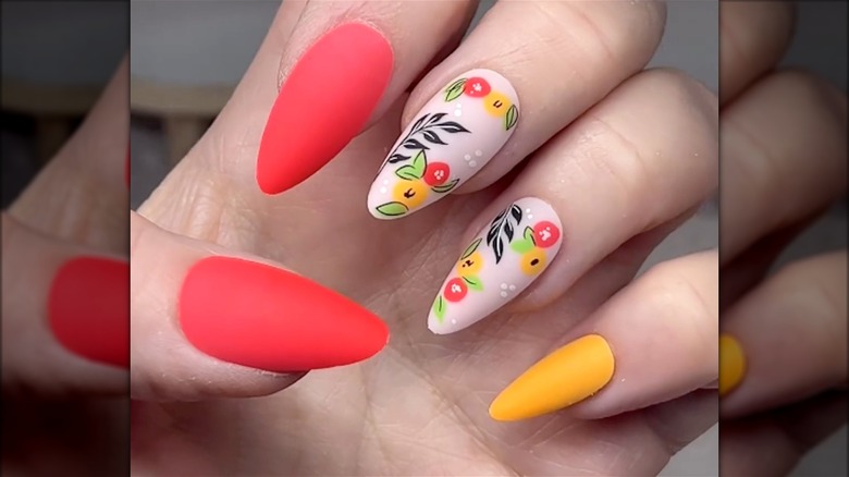 Coral and yellow floral nails manicure