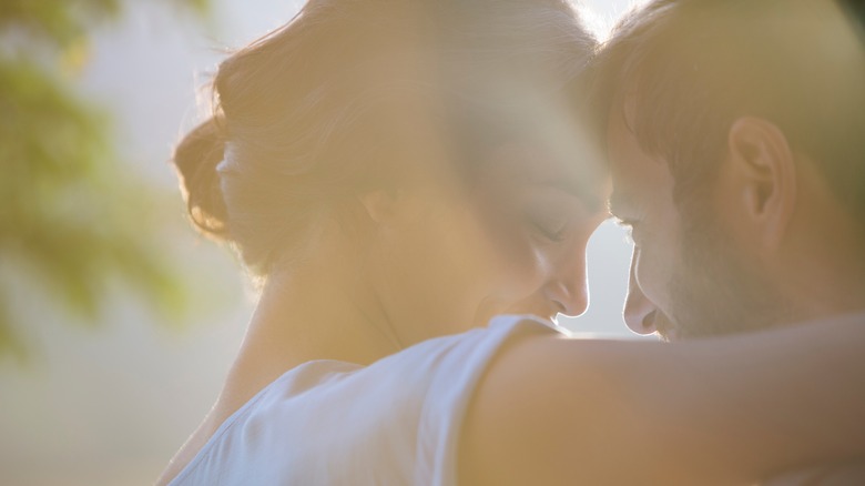  couple smiling and hugging