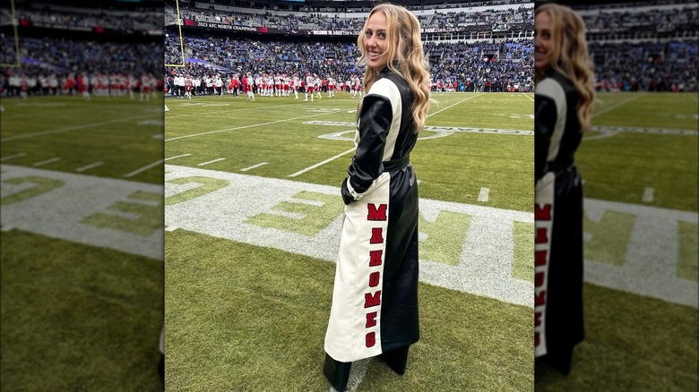 Brittany Mahomes wearing a black and white coat.