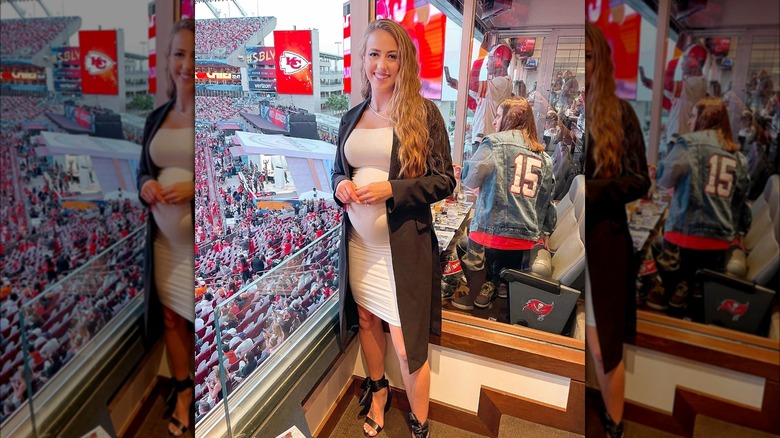 Pregnant Brittany Mahomes in white slim-fit dress