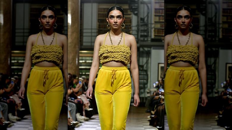 Model in yellow woven crop