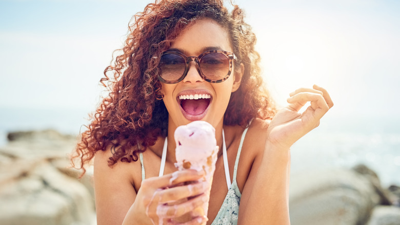 Woman eating ice cream cone