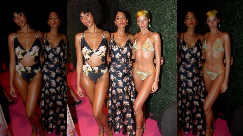 Models in floral bathing suits