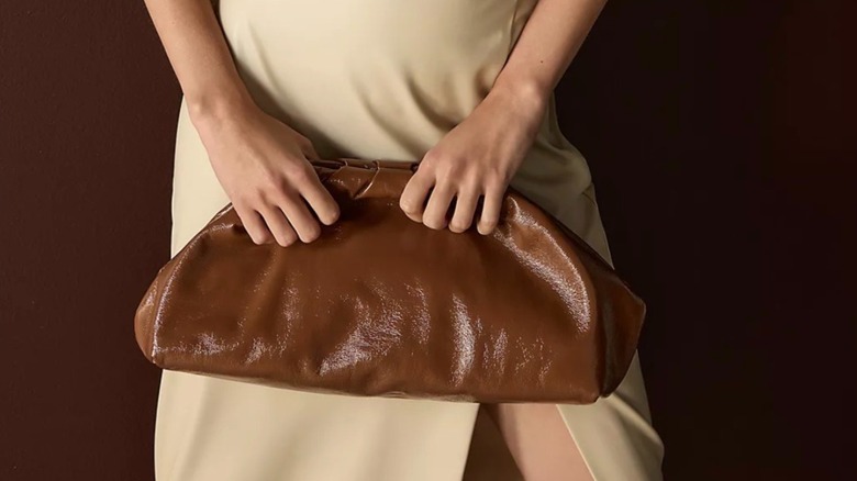 Brown leather huggie clutch