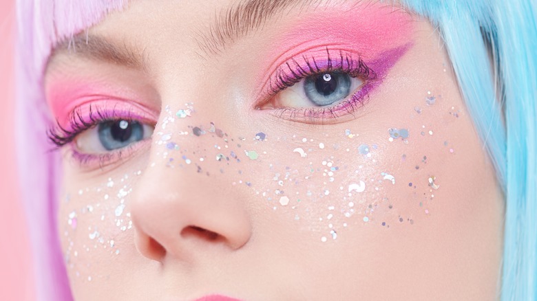 Glitter on face with makeup