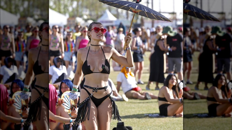 Woman wearing belt and bikini at Coachella
