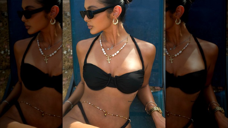 Sandra Ann wearing bikini and beaded body chain