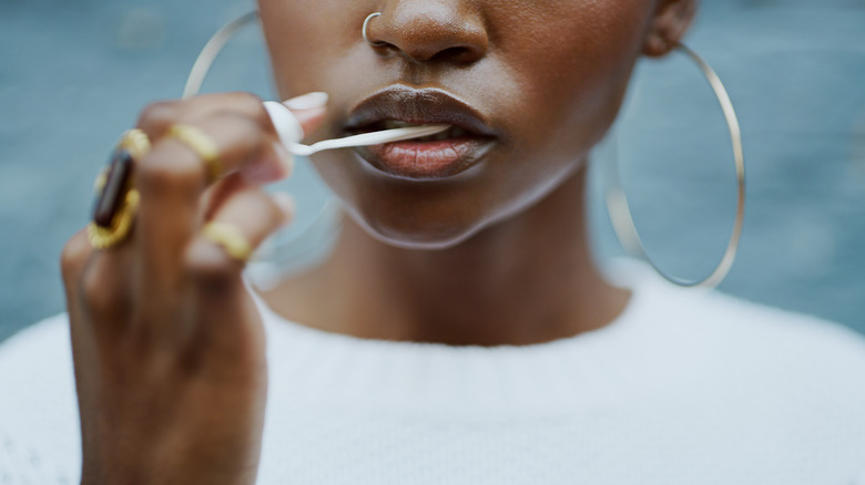 Woman chewing gum