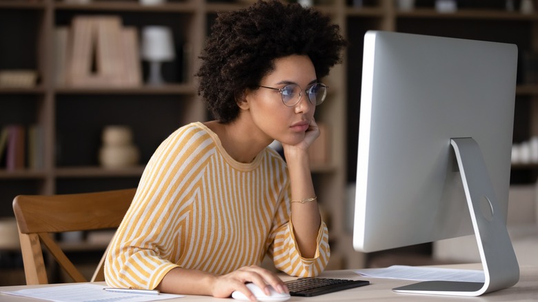 woman focused on computer