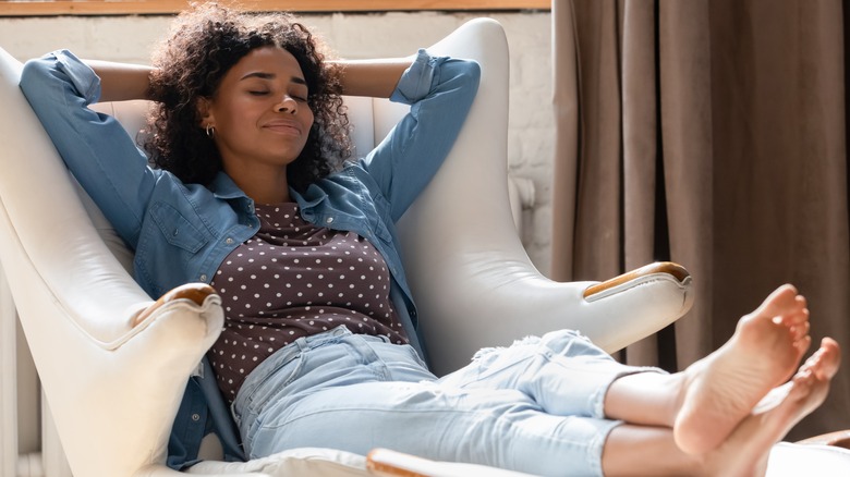 Woman practices deep breathing