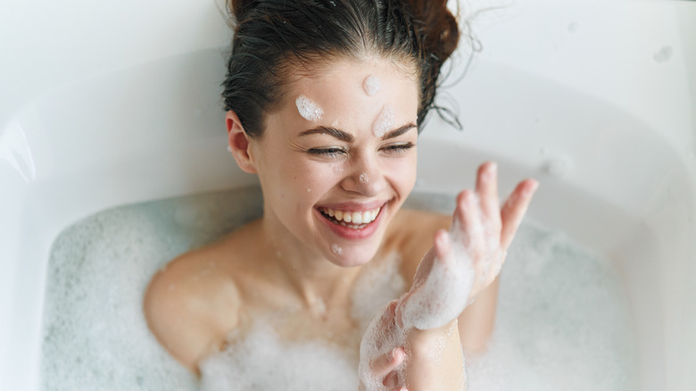 Woman enjoying a bubble bath